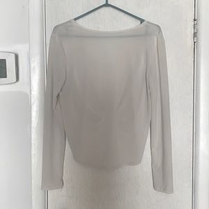 Swoop back long sleeve blouse